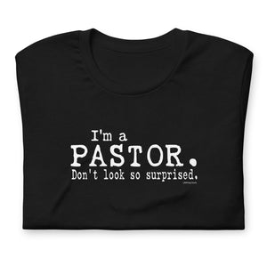 "I'm a Pastor. Don't look so surprised." Unisex t-shirt