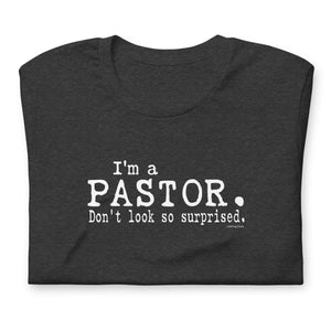 "I'm a Pastor. Don't look so surprised." Unisex t-shirt