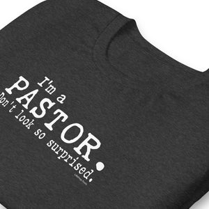 "I'm a Pastor. Don't look so surprised." Unisex t-shirt